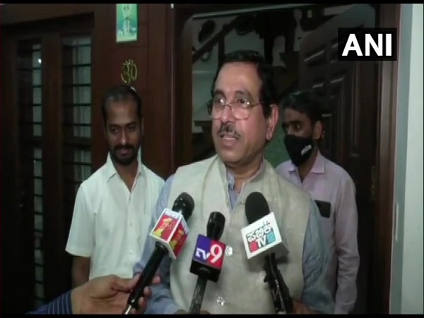 Union Minister Pralhad Joshi speaking to reporters. (Photo/ANI)