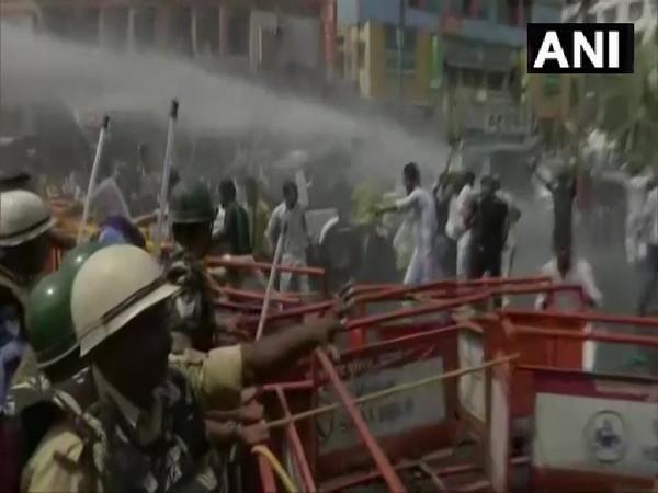 Police used opened water cannon and lathi-charged RJD workers during a protest in Patna on Tuesday. [Photo/ANI]