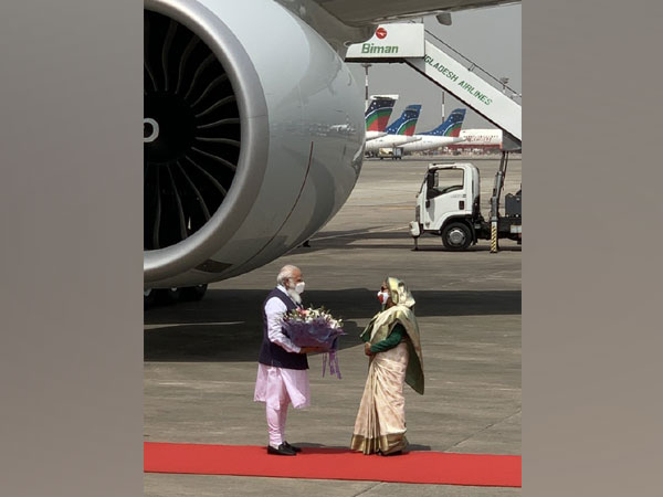 Prime Minister Narendra Modi with his Bangladeshi counterpart Sheikh Hasina at Dhaka Airport on Friday. (Source: Twitter/PMO)