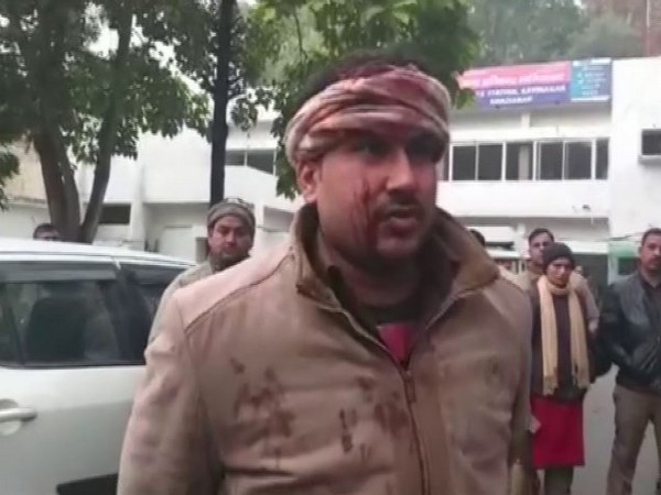 Sandeep, the constable in the Excise department talking to reporters in Ghaziabad on Wednesday. Photo/ANI