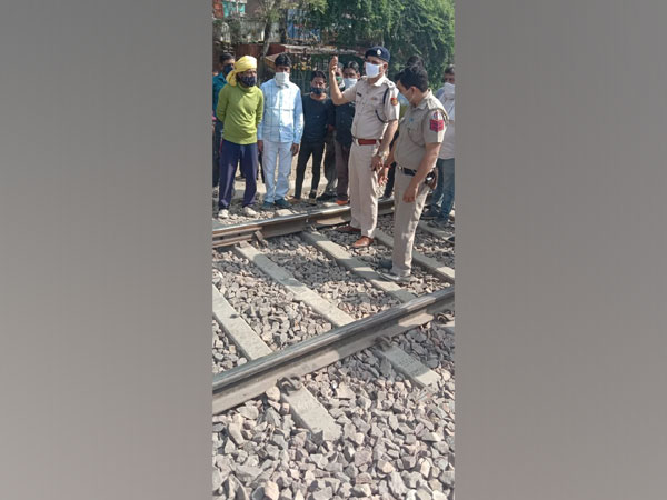 Railway officials at the site where considerable breakage in the railway track was reported near Mangolpuri in Delhi on Saturday. [Photo/ANI]