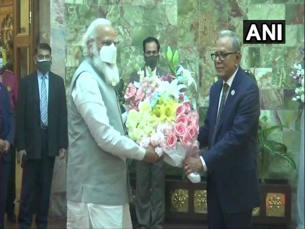 Prime Minister Narendra Modi meets Bangladesh's President Abdul Hamid in Dhaka.
