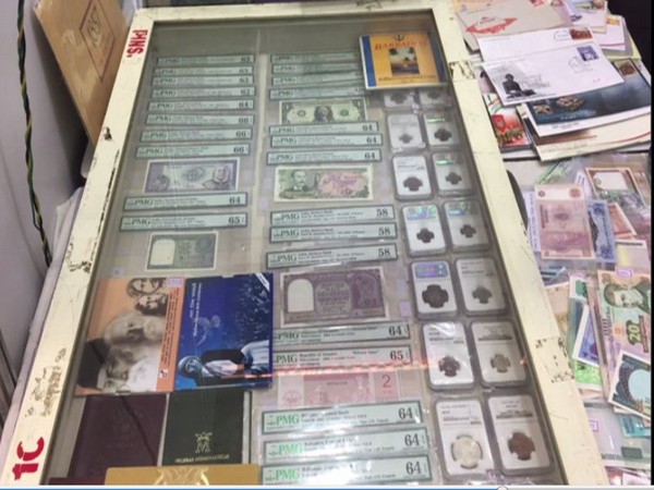 Rare notes, coins and postage stamps displayed in the exhibition at Indraprastha Hall in Nashik, Maharashtra.