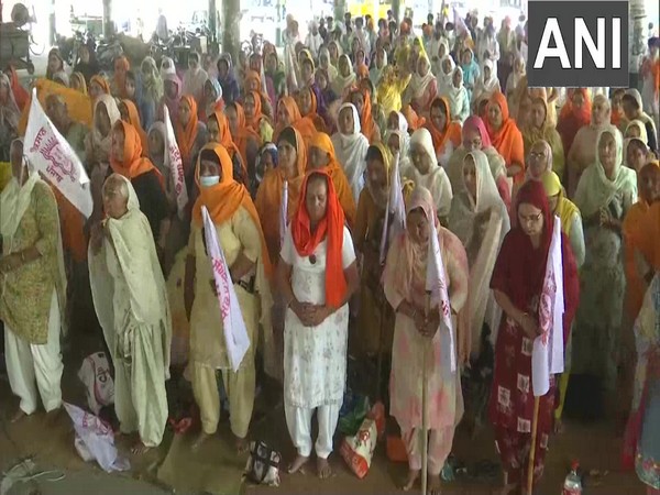 Women protesting at Jandiala Guru Dana Mandi in Amritsar on Tuesday