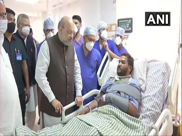 Amit Shah meets the injured soldiers receiving treatment at a Raipur hospital on Monday. [Photo/ANI]