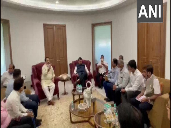 Former Maharashtra CM Devendra Fadnavis meeting with Trade Association representatives in Mumbai. (Photo/ANI) 