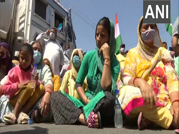 Locals, family members of missing CRPF jawan block Jammu-Akhnoor highway (Photo/ANI)