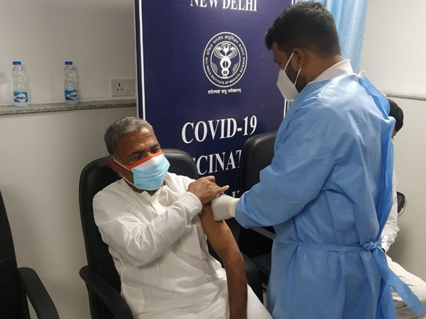 Rajya Sabha Deputy Chairman Harivansh taking COVID vaccine jab in Delhi's AIIMS.