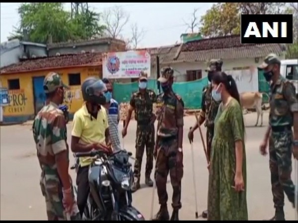 DSP Shilpa Sahu inspecting  a man on bike on Tuesday. (Photo/ANI)