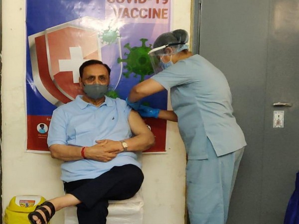 Gujarat Chief Minister Vijay Rupani getting vaccinated against COVID-19. (Photo/ANI)