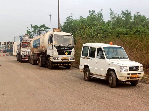 The oxygen-laden tankers leaving Odisha. (Photo: Twitter @odisha_police)