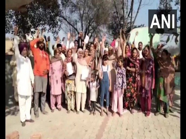 Residents of Virk Khurd gram panchayat in Punjab's Bathinda. (Photo/ANI)
