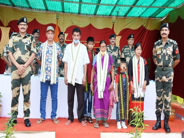 NLFT commander surrendering to BSF in Tripura. 