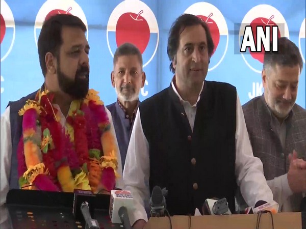 Jammu and Kashmir People's Conference's president Sajad Lone along with other leaders