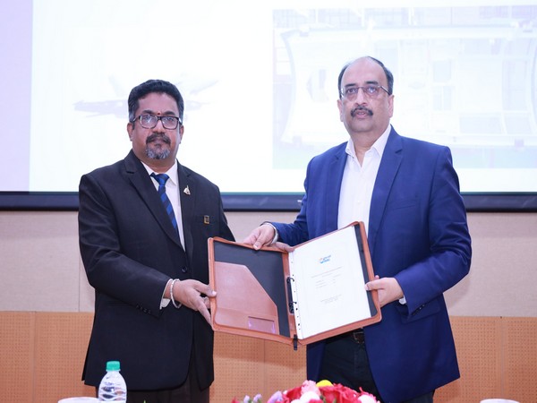 S Manicka Vasagam handing over documents to  Ashwani Bhargava, the Director-Supplier Development, Boeing. (Photo/ @HALHQBLR)