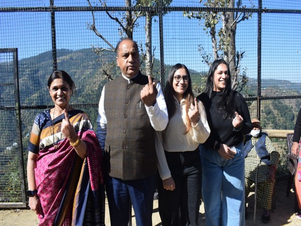 CM Jairam Thakur and his family members show their inked fingers ater casting their votes for Mandi by-poll on Saturday. (Photo/ANI) 