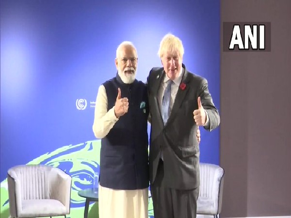PM Modi meets UK PM Boris Johnson on the sidelines of #COP26 World Leaders' Summit in Glasgow, Scotland