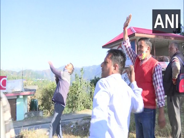 The traditional stone-pelting event was a low-key affair in Himachal's Dhami this time. (Photos/ANI)