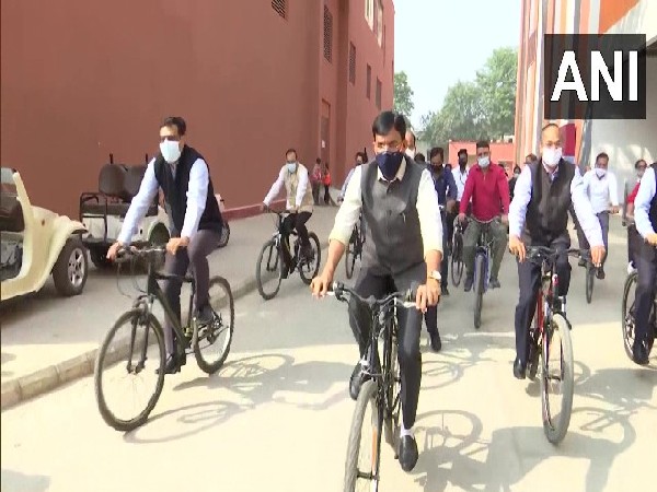 Union Health Minister Mansukh Mandaviya cycles to inaugurate Health Pavilion at India International Trade Fair in Delhi on Tuesday. (Photo/ANI)