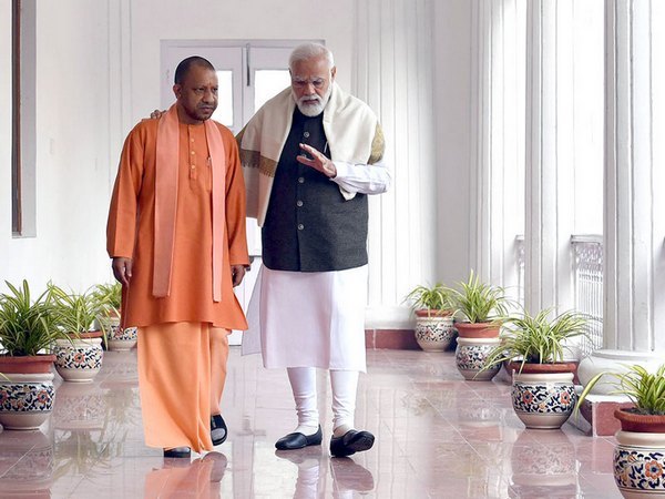 Uttar Pradesh Chief Minister Yogi Adityanath with Prime Minister Narendra Modi