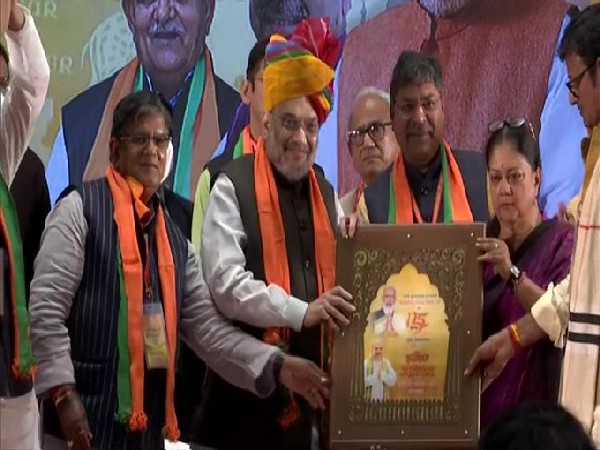 BJP National Vice-President Vasundhara Raje, former minister Gulab Chand Kataria and State BJP president Satish Poonia welcome Amit Shah in Jaipur on Sunday. [Photo/ANI]