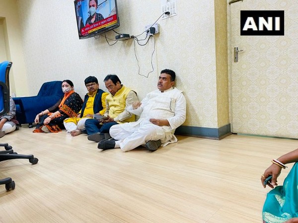 LoP Suvendu Adhikari with BJP delegation hold a sit-in strike inside the State Election Commissioner Office. (Photo/ANI)