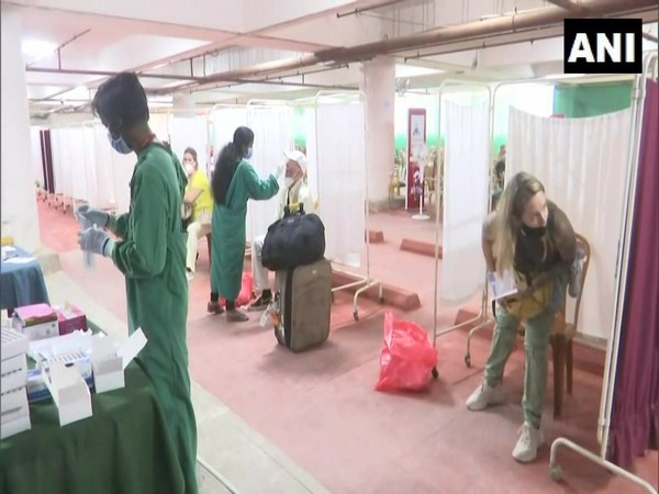 Tourists going through COVID-19 tests upon their arrival at Goa International airport. (Photo/ANI)