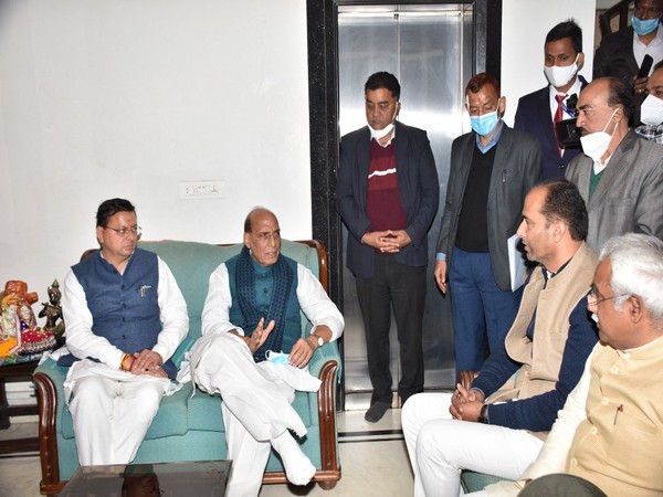 Defence Minister Rajnath Singh along with Uttarakhand CM Dhami at the residence of Harbans Kapoor. (Photo/ANI)