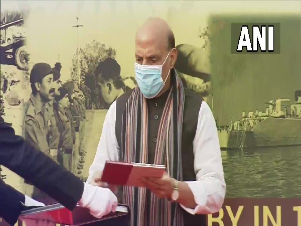 Defence Minister Rajnath Singh issues a commemorative stamp on the occasion of 50th Vijay Diwas at the National War Memorial in New Delhi on Thursday. (Photo/ ANI)