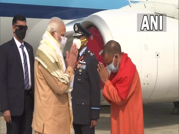 Prime Minister Narendra Modi with Uttar Pradesh Chief Minister Yogi Adityanath at Prayagraj (Photo/ANI)