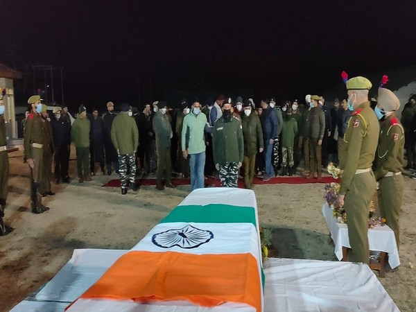 A wreath-laying ceremony was held at District Police Lines Awantipora to pay homage to ASI Mohd Ashraf. (Photo/ANI)