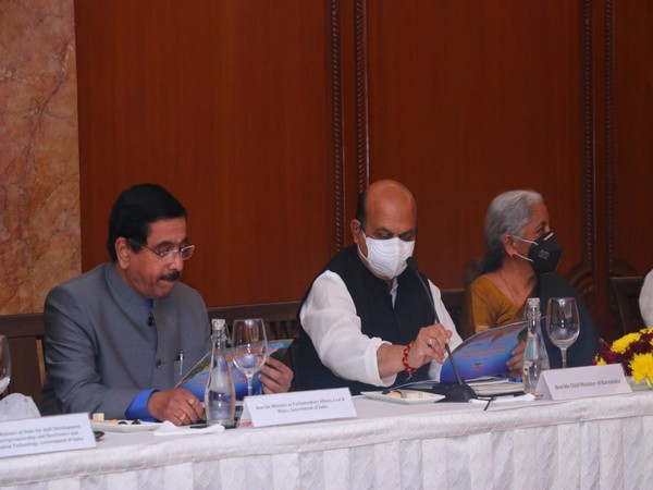 Karnataka Chief Minister Basavaraj Bommai (centre)