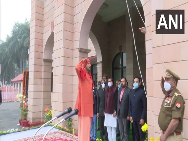 UP CM Yogi Adityanath unfurls national flag (Photo/ANI)