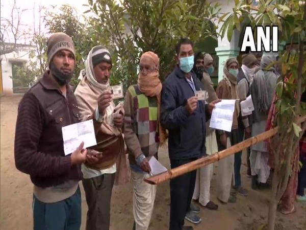 Voters at a voting centre in Bulandshahr (Photo/ANI)