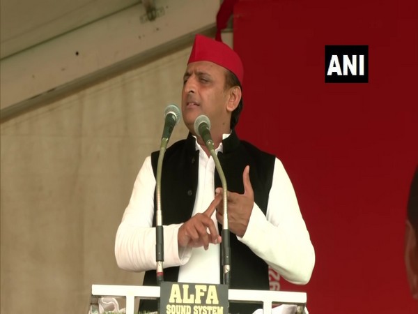 SP chief Akhilesh Yadav addressing a rally in Badaun (Photo/ANI)