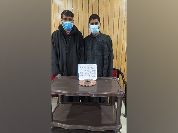 Two arrested TRF terrorist with 40 live rounds of AK 47. (Photo/ANI)