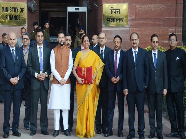 Finance Minister Nirmala Sitharaman with her team in New Delhi on Saturday. Photo/ANI
