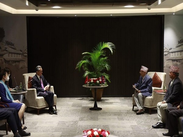Chinese Foreign Minister Wang Yi with Former Nepal Prime Minister KP Sharma Oli