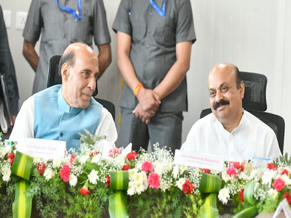 Karnataka CM Basavaraj Bommai (R) with Defence Minister Rajnath Singh at Bengaluru 