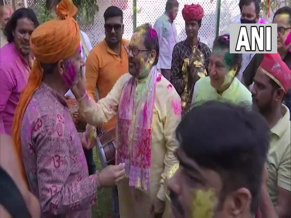 Mukhtar Abbas Naqvi playing colours on the occasion of Holi. (Photo/ANI)