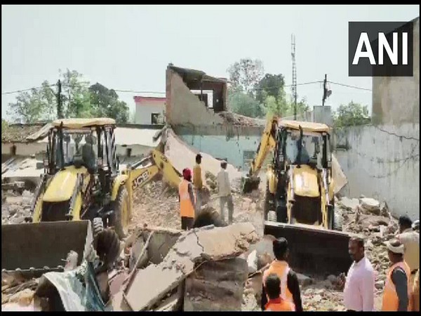 A visual from the scene of rape accused house demolition (Photo/ANI)