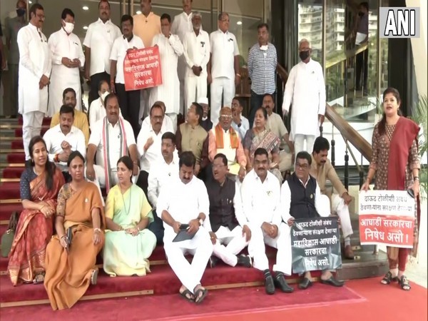 BJP MLA's continue to protest outside Maharashtra Assembly demanding resignation of state minister Nawab Malik. (Photo/ANI)