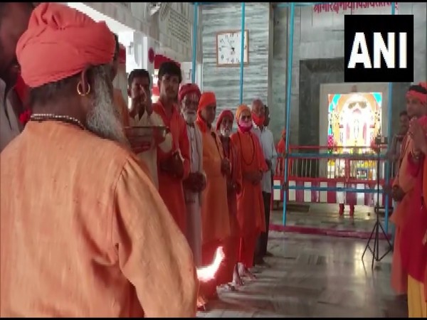 Head priest of Gorakhpur temple performs special puja ahead of oath-taking ceremony of CM-designate Yogi Adityanath (Photo/ANI)