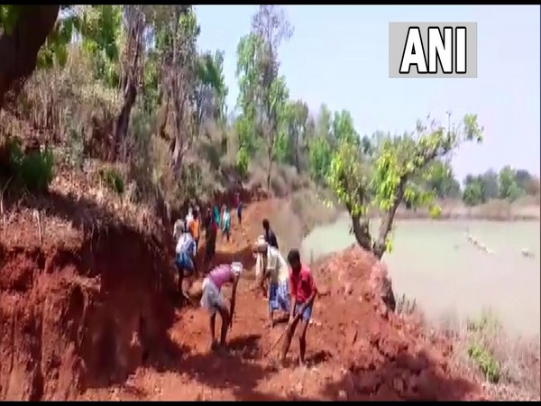 Villagers constructing a road on their own in Parpatiya village of Chhattisgarh's Surguja (Photo/ANI)