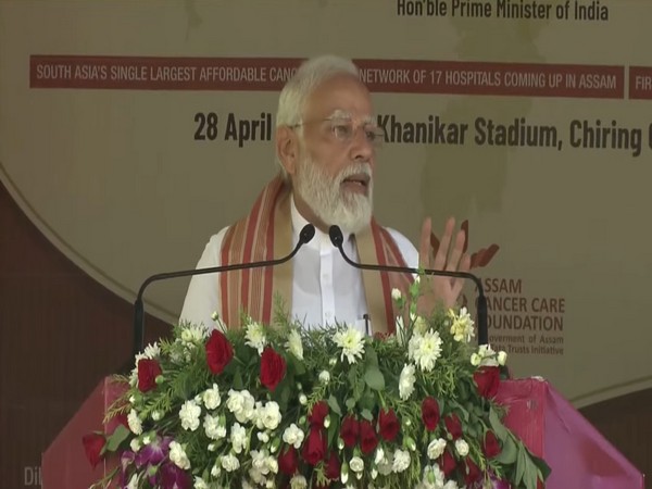 Prime Minister Narendra Modi addressing a gathering in Assam (Photo/ANI)