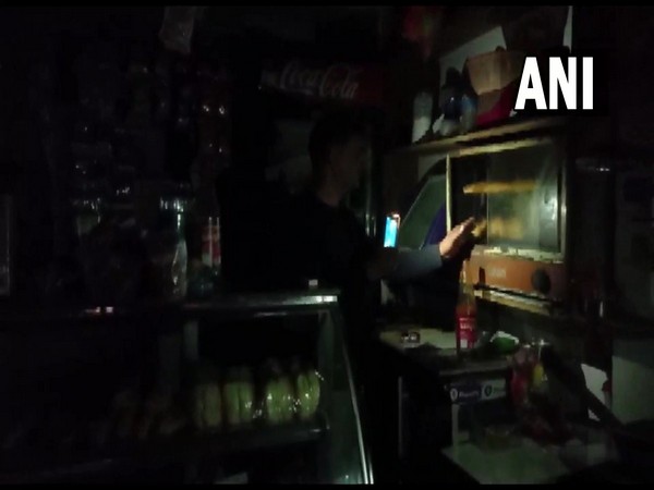 Visual of a confectionary shop in Jharkhand, being run during power outage (Photo/ANI)