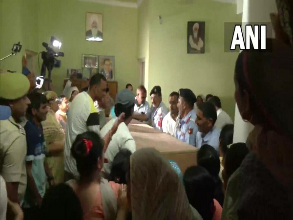 Mortal remains of the woman teacher brought to her residence in Samba. (Photo/ANI)
