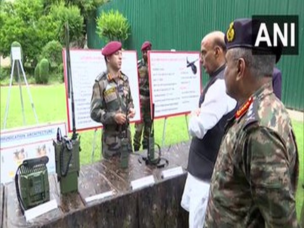 Defence Minister Rajnath Singh inspects communication equipment at 15 Corps headquarters. (photo/ANI)