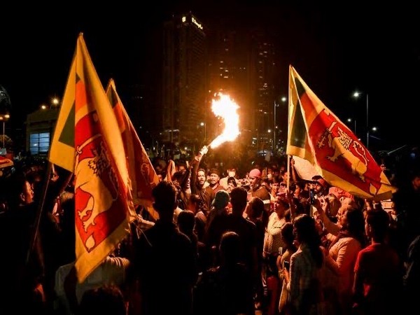 Protestors gathered outside Ranil Wickremesinghe's house (Image credit: Twitter)