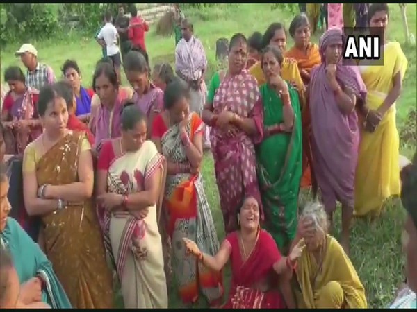 Family members of the farmer mourn his death